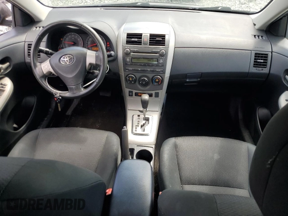 2010 Toyota Corolla with VIN 2T1BU4EE2AC512164, listed as a Copart auction lot 56251415 with 135,492 mi miles and Salvage title. Bid and sale history available at DreamBid. Image 8.