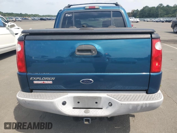 2001 Ford Explorer Sport Trac z VIN 1FMZU77E91UC28669, wystawiony jako Copart lot #76438624 z przebiegiem 128 484 mil mil oraz Nie do naprawy • Non repairable. Historia ofert i sprzedaży dostępna na DreamBid. Obrazek 6.