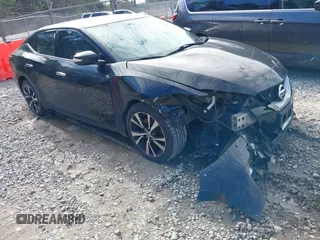 2016 Nissan Maxima Platinum with VIN 1N4AA6AP1GC412989, listed as a IAAI auction lot 41338056 with 243,336 mi miles and . Bid and sale history available at DreamBid. Image 1.