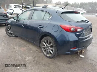2018 Mazda 3 Touring with VIN 3MZBN1L34JM204883, listed as a IAAI auction lot 41094541 with 125,205 mi miles and . Bid and sale history available at DreamBid. Image 3.