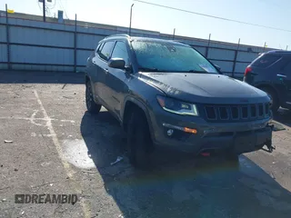 2019 Jeep Compass Trailhawk z VIN 3C4NJDDB2KT716281, wystawiony jako IAAI lot #41840458 z przebiegiem 89 246 mil mil oraz . Historia ofert i sprzedaży dostępna na DreamBid. Obrazek 1.