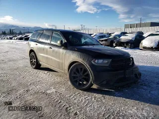 2014 Dodge Durango R/T with VIN 1C4SDJCT9EC977300, listed as a Copart auction lot 49930435 with 165,569 mi miles and Salvage title. Bid and sale history available at DreamBid. Image 12.
