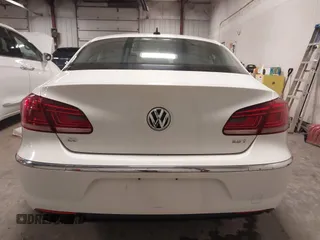 2013 Volkswagen CC Sport Plus z VIN WVWBP7AN6DE535513, wystawiony jako IAAI lot #41338242 z przebiegiem 107 558 mil mil oraz . Historia ofert i sprzedaży dostępna na DreamBid. Obrazek 17.