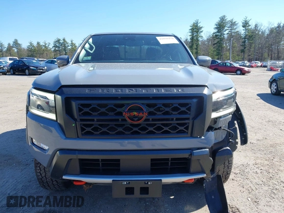 2022 Nissan Frontier SV z VIN 1N6ED1EKXNN659026, wystawiony jako IAAI lot #42050476 z przebiegiem 26 183 mil mil oraz . Historia ofert i sprzedaży dostępna na DreamBid. Obrazek 13.