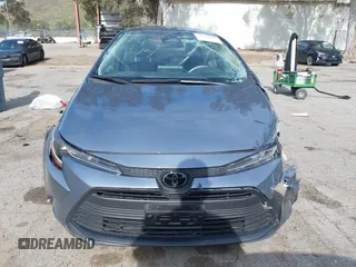 2023 Toyota Corolla LE with VIN JTDB4MEE7P3009635, listed as a IAAI auction lot 41808167 with 22,773 mi miles and . Bid and sale history available at DreamBid. Image 12.