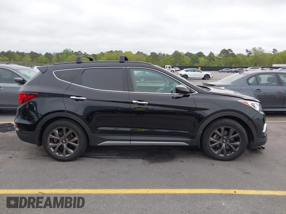 2018 Hyundai Santa Fe Ultimate with VIN 5XYZWDLA6JG570808, listed as a IAAI auction lot 41941878 with 47,391 mi miles and . Bid and sale history available at DreamBid. Image 13.