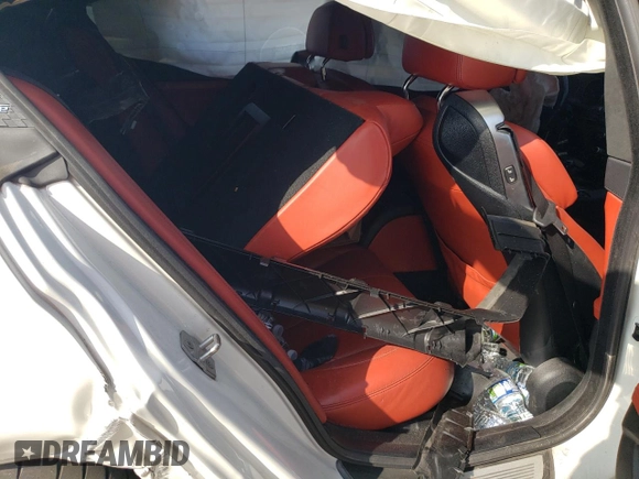 2015 BMW M6 z VIN WBS6C9C51FD467998, wystawiony jako Copart lot #67775934 z przebiegiem Nie podano mil oraz Szkody całkowita. Historia ofert i sprzedaży dostępna na DreamBid. Obrazek 11.