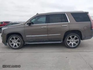 2015 Cadillac Escalade Luxury with VIN 1GYS3MKJ9FR725818, listed as a IAAI auction lot 41596731 with 224,246 mi miles. Bid and sale history available at carsss.com. Image 14.