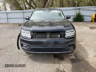 2018 Volkswagen Atlas SE z VIN 1V2LR2CA2JC506981, wystawiony jako Copart lot #55067115 z przebiegiem 140 545 mil mil oraz Szkody całkowita. Historia ofert i sprzedaży dostępna na DreamBid. Obrazek 5.