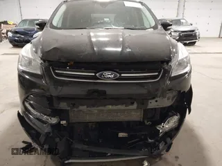 2014 Ford Escape Titanium with VIN 1FMCU9J96EUE26645, listed as a IAAI auction lot 41835893 with 83,730 mi miles. Bid and sale history available at carsss.com. Image 6.