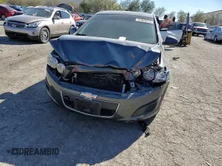 2012 Chevrolet Sonic LS z VIN 1G1JA6SHXC4171044, wystawiony jako Copart lot #45956415 z przebiegiem 133 324 mil mil oraz Szkoda całkowita • Salvage title. Historia ofert i sprzedaży dostępna na DreamBid. Obrazek 12.