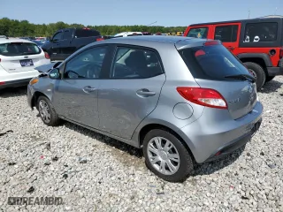 2012 Mazda Mazda2 Sport with VIN JM1DE1KZXC0140257, listed as a Copart auction lot 70361264 with 55,266 mi miles and Salvage Title. Bid and sale history available at carsss.com. Image 2.