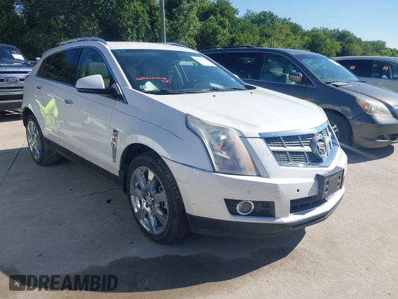 2011 Cadillac SRX Premium Collection z VIN 3GYFNCEYXBS579760, wystawiony jako IAAI lot #42238707 z przebiegiem Nie podano mil oraz . Historia ofert i sprzedaży dostępna na DreamBid. Obrazek 1.
