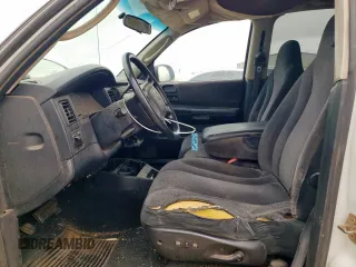 2001 Dodge Dakota Sport z VIN 1B7GL2AN51S118157, wystawiony jako Copart lot #58797325 z przebiegiem 147 765 mil mil oraz Szkoda całkowita • Salvage title. Historia ofert i sprzedaży dostępna na DreamBid. Obrazek 7.
