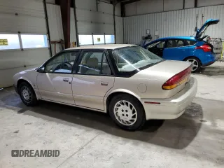 1995 Saturn SL with VIN 1G8ZK5271SZ238117, listed as a Copart auction lot 83723624 with 80,535 mi miles and Clean title. Bid and sale history available at DreamBid. Image 2.