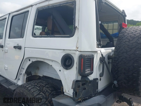2016 Jeep Wrangler Unlimited Rubicon Hard Rock with VIN 1C4BJWFG3GL228449, listed as a IAAI auction lot 42158318 with Not provided miles and . Bid and sale history available at DreamBid. Image 16.