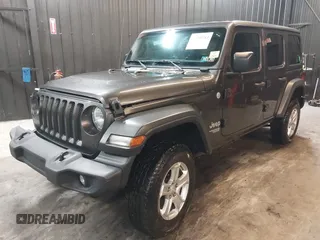 2018 Jeep Wrangler Unlimited Sport S with VIN 1C4HJXDG5JW126496, listed as a IAAI auction lot 42390584 with 163,476 mi miles and . Bid and sale history available at DreamBid. Image 19.