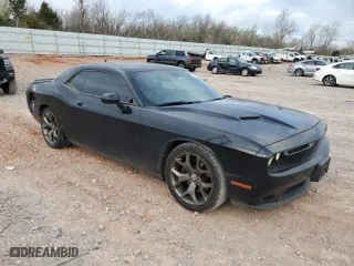 2015 Dodge Challenger SXT Plus with VIN 2C3CDZBG2FH900746, listed as a Copart auction lot 48233265 with 132,438 mi miles and Salvage Title. Bid and sale history available at carsss.com. Image 4.