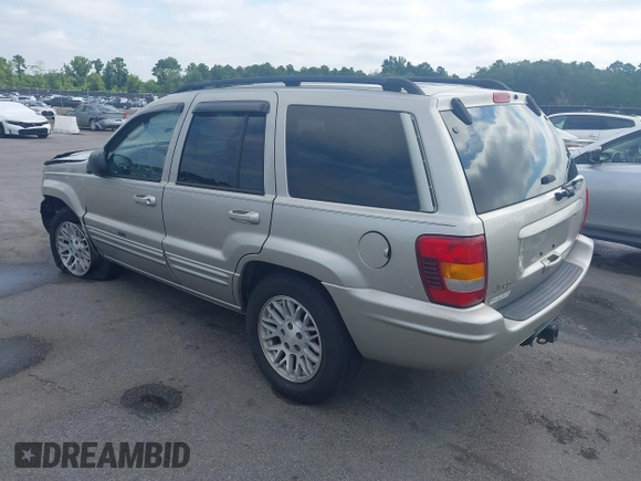 2004 Jeep Grand Cherokee Limited with VIN 1J4GX58SX4C255363, listed as a IAAI auction lot 42619798 with 239,475 mi miles and . Bid and sale history available at DreamBid. Image 3.
