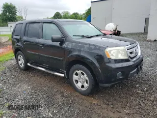 2010 Honda Pilot LX z VIN 5FNYF4H25AB029785, wystawiony jako Copart lot #56976365 z przebiegiem 170 842 mil mil oraz Szkoda całkowita • Salvage title. Historia ofert i sprzedaży dostępna na DreamBid. Obrazek 4.