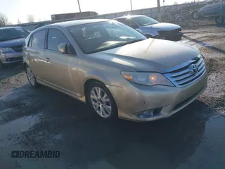 2011 Toyota Avalon with VIN 4T1BK3DBXBU374851, listed as a IAAI auction lot 41187710 with 215,815 mi miles and . Bid and sale history available at carsss.com. Image 1.