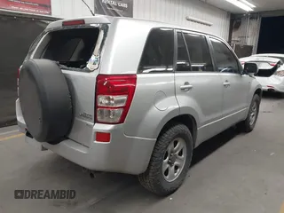2008 Suzuki Grand Vitara w/Spare & Cargo Covers z VIN JS3TD941X84101254, wystawiony jako IAAI lot #42043908 z przebiegiem 137 180 mil mil oraz . Historia ofert i sprzedaży dostępna na DreamBid. Obrazek 4.