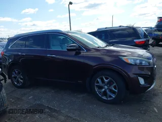 2016 Kia Sorento SX with VIN 5XYPKDA58GG002304, listed as a IAAI auction lot 41990332 with 132,025 mi miles. Bid and sale history available at carsss.com. Image 13.