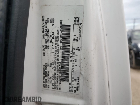 2000 Ford Econoline Passenger XL with VIN 1FBSS31L1YHB80264, listed as a Copart auction lot 74762814 with 61,702 mi miles and Salvage Title. Bid and sale history available at DreamBid. Image 14.