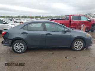 2019 Toyota Corolla L with VIN 5YFBURHE8KP873067, listed as a IAAI auction lot 41936471 with 75,076 mi miles and . Bid and sale history available at carsss.com. Image 13.