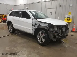 2014 Jeep Grand Cherokee Limited with VIN 1C4RJFBT7EC240697, listed as a Copart auction lot 79577194 with 98,941 mi miles and Clean Title. Bid and sale history available at carsss.com. Image 4.