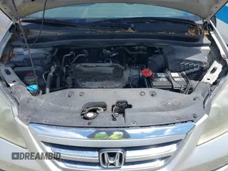 2005 Honda Odyssey LX with VIN 5FNRL38295B038177, listed as a IAAI auction lot 42618657 with 260,881 mi miles and . Bid and sale history available at DreamBid. Image 10.