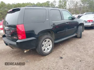 2012 GMC Yukon SLT with VIN 1GKS1CE09CR141878, listed as a IAAI auction lot 41552512 with 204,253 mi miles. Bid and sale history available at carsss.com. Image 4.