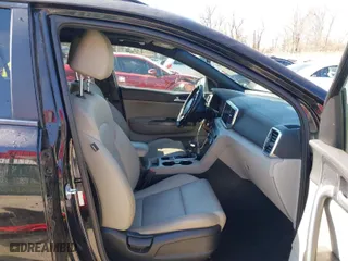 2021 Kia Sportage S with VIN KNDP6CACXM7867510, listed as a IAAI auction lot 41740288 with 64,198 mi miles. Bid and sale history available at carsss.com. Image 5.