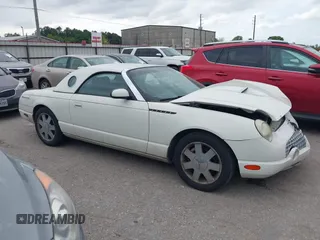 2002 Ford Thunderbird w/Hardtop Premium with VIN 1FAHP60A62Y127579, listed as a IAAI auction lot 42035019 with 98,582 mi miles. Bid and sale history available at carsss.com. Image 13.