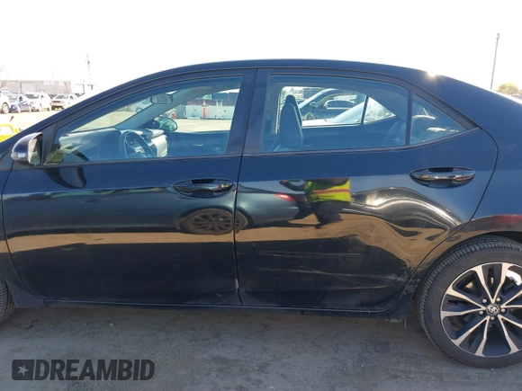 2019 Toyota Corolla L z VIN 5YFBURHE7KP857880, wystawiony jako IAAI lot #41850987 z przebiegiem 117 823 mil mil oraz . Historia ofert i sprzedaży dostępna na DreamBid. Obrazek 14.