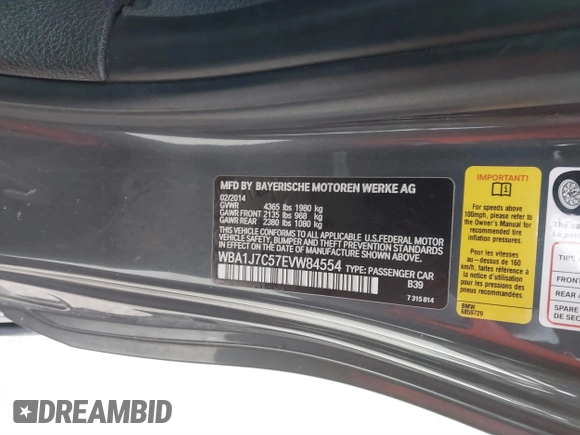 2014 BMW 2 Series M235i with VIN WBA1J7C57EVW84554, listed as a IAAI auction lot 41564175 with 121,632 mi miles and . Bid and sale history available at carsss.com. Image 9.