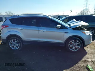2015 Ford Escape Titanium with VIN 1FMCU0J93FUC02844, listed as a IAAI auction lot 41531293 with 115,392 mi miles and . Bid and sale history available at DreamBid. Image 14.