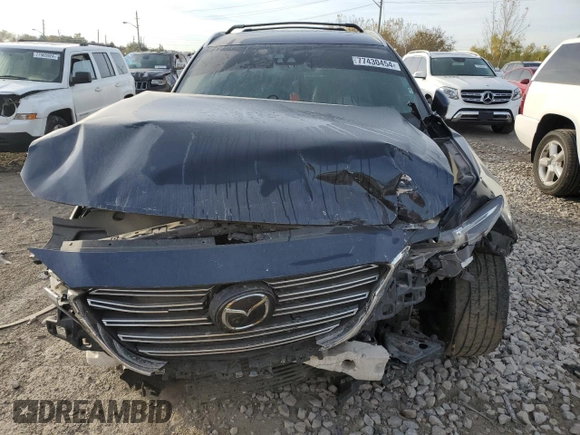 2017 Mazda CX-9 Grand Touring z VIN JM3TCBDY7H0128867, wystawiony jako Copart lot #77430454 z przebiegiem 138 077 mil mil oraz Nie do naprawy • Non repairable. Historia ofert i sprzedaży dostępna na DreamBid. Obrazek 5.
