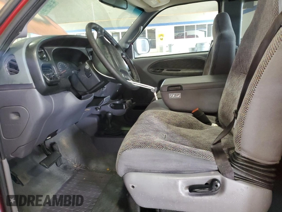 2001 Dodge 1500 z VIN 3B7HF13Z51M569779, wystawiony jako Copart lot #56852355 z przebiegiem 184 855 mil mil oraz Szkoda całkowita • Salvage title. Historia ofert i sprzedaży dostępna na DreamBid. Obrazek 7.
