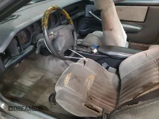 1990 Pontiac Firebird z VIN 1G2FS23T2LL200780, wystawiony jako Copart lot #50364665 z przebiegiem 101 108 mil mil oraz Czysty tytuł • Clean title. Historia ofert i sprzedaży dostępna na DreamBid. Obrazek 7.