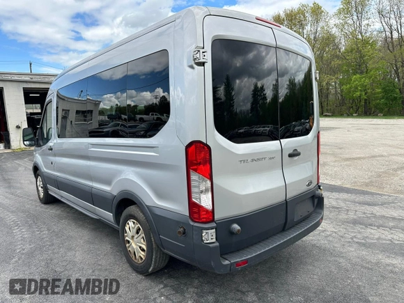 2015 Ford Transit Passenger XL with VIN 1FBAX2CM0FKA41966, listed as a Copart auction lot 56363935 with 164,365 mi miles and Clean Title. Bid and sale history available at DreamBid. Image 2.