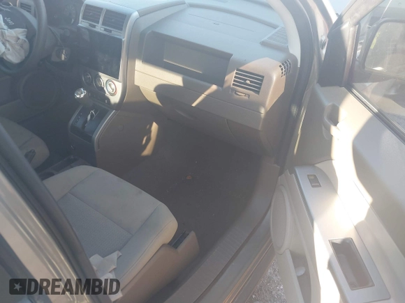 2007 Jeep Compass Sport with VIN 1J8FT47W57D158543, listed as a IAAI auction lot 41817636 with 241,439 mi miles. Bid and sale history available at carsss.com. Image 5.