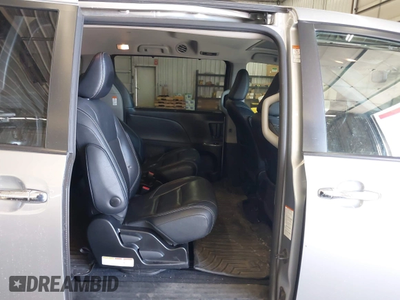 2015 Toyota Sienna SE with VIN 5TDXK3DC9FS527667, listed as a IAAI auction lot 41977729 with 230,933 mi miles and . Bid and sale history available at DreamBid. Image 8.