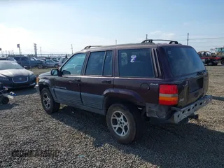 1996 Jeep Grand Cherokee Laredo with VIN 1J4GZ58S2TC262980, listed as a IAAI auction lot 41949514 with 269,674 mi miles and . Bid and sale history available at DreamBid. Image 3.