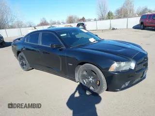 2011 Dodge Charger RT Plus with VIN 2B3CL5CT7BH616785, listed as a IAAI auction lot 41679154 with 113,800 mi miles. Bid and sale history available at carsss.com. Image 1.