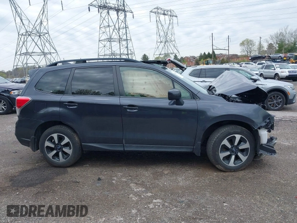 2018 Subaru Forester Premium with VIN JF2SJAEC7JH574341, listed as a IAAI auction lot 42021599 with 58,000 mi miles and . Bid and sale history available at DreamBid. Image 14.