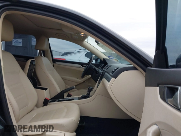 2019 Volkswagen Passat 2.0T Wolfsburg Edition with VIN 1VWLA7A36KC007173, listed as a IAAI auction lot 41357381 with 79,356 mi miles. Bid and sale history available at carsss.com. Image 5.
