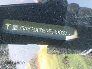 2024 Tesla Model Y с VIN 7SAYGDED5RF010087, выставлен на аукционе IAAI как лот 41312466 с пробегом Не указан миль и . История ставок и продаж доступна на DreamBid. Изображение 9.