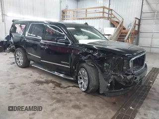 2016 GMC Yukon XL Denali with VIN 1GKS2HKJ6GR433999, listed as a IAAI auction lot 41421698 with 124,586 mi miles. Bid and sale history available at carsss.com. Image 1.