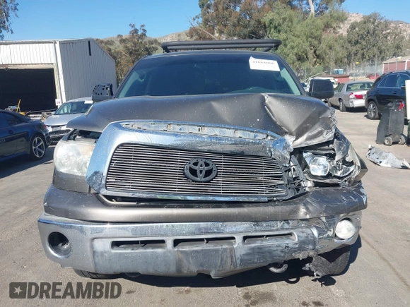 2008 Toyota Tundra z VIN 5TFEV54178X038920, wystawiony jako IAAI lot #41668006 z przebiegiem 217 053 mil mil oraz . Historia ofert i sprzedaży dostępna na DreamBid. Obrazek 12.